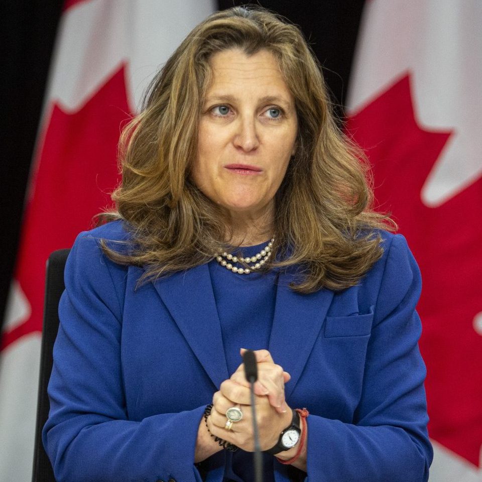 Finance Minister Chrystia Freeland tries on new shoes in preparation