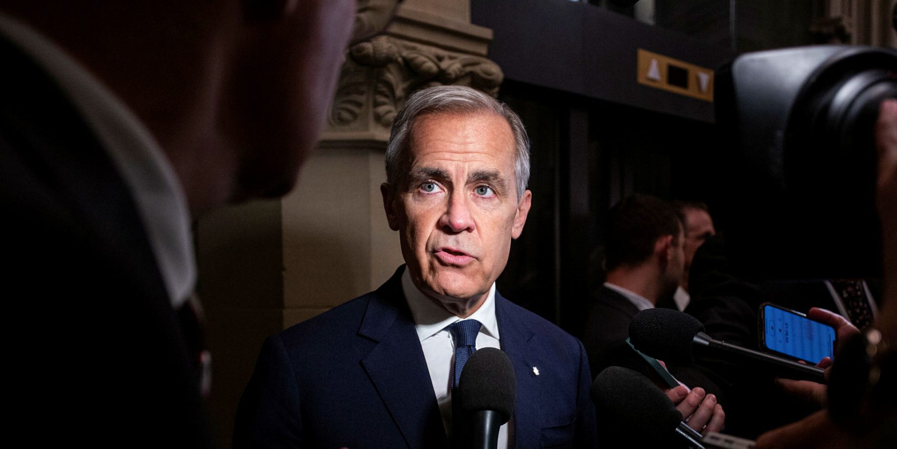 Prime Minister Mark Carney speaks with reporters outside the Liberal party caucus meeting from West Block on June 4, 2025. The Hill Times photograph by Andrew Meade