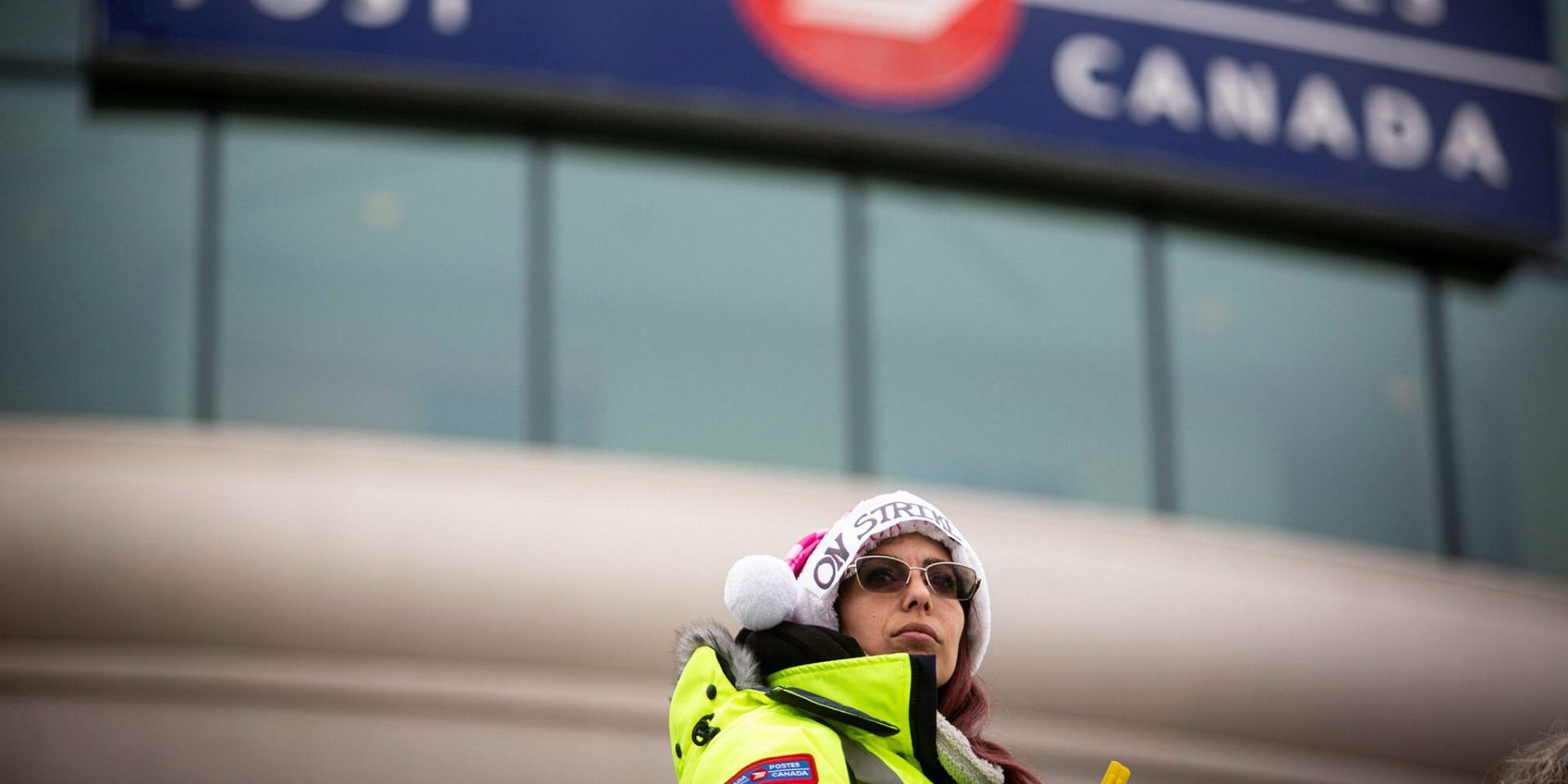 Aurelia Arcaro, a Canada Post worker from Rigaud, Que., pickets outside the head office in Ottawa on Nov. 28, 2024. The Hill Times photograph by Andrew Meade