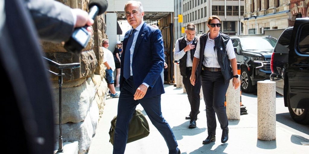 Prime Minister Mark Carney enters The Office of the Prime Minister in downtown Ottawa on Aug. 6, 2025. The Hill Times photograph by Andrew Meade