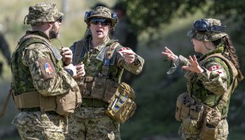 Medical technicians from the Canadian Armed Forces engaged in a discussion regarding the modifications to upcoming medical scenarios for members of the Armed Forces of Ukraine, as part of their basic training course at Operation UNIFIER - United Kingdom Training Element on August 25, 2024.

 

Photo credit: Canadian Armed Forces Imagery Technician