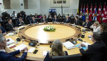 Prime Minister Justin Trudeau and Doug Ford, Premier of Ontario, deliver opening remarks at the First Ministers Meeting in Ottawa on Jan. 15, 2025. The Hill Times photograph by Andrew Meade