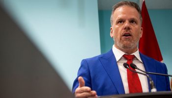 Minister of Health Mark Holland makes an announcement about the Canadian Dental Care Program at Dentistry at Bank St in Ottawa on Aug. 7, 2024.