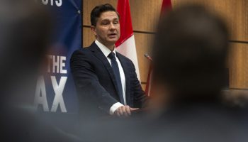 Conservative Party leader Pierre Poilievre speaks to his caucus in West Block on Sept. 15, 2024, before the party’s caucus retreat.