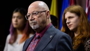 NDP MP Randall Garrison attends a press conference in West Block on Nov. 20, 2023, to call on the government to ensure protection of the rights of trans people and children. The Hill Times photograph by Andrew Meade