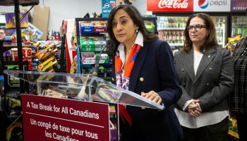 President of the Treasury Board Anita Anand speaks at an announcement about the government’s sales tax holiday on essential items at Sherwood Deli in Ottawa on Nov. 22, 2024.