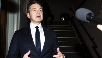 Conservative Party Leader Pierre Poilievre speaks with reporters before going in to a meeting with Prime Minister Mark Carney in West Block on Oct. 22, 2025, to discuss budget priorities. The Hill Times photograph by Andrew Meade