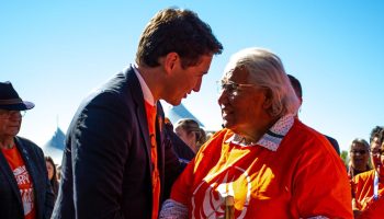 Prime Minister Justin Trudeau shakes hands with Senator Murray Sinclair