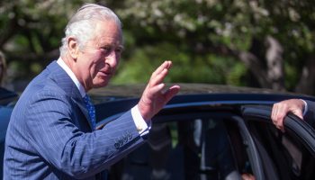 Royal Highnesses Prince Charles, The Prince of Wales waves as he leaves the Royal Canadian Geographical Society for a Prince’s Trust and Bird Foundation engagement on May 18, 2022, during the National Capital Region stop of his Canadian tour.