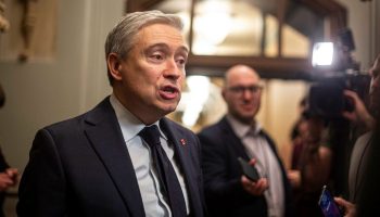 Minister of Innovation, Science and Industry François-Philippe Champagne speaks with reporters before the Liberal cabinet meeting in West Block on Feb. 6, 2024.