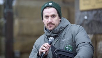 Nate Prier, CAPE president, speaks at a rally outside the Prime Minister’s Office on  Dec. 10, 2024. Hill Times photograph by Andrew Meade