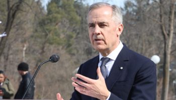 Prime Minister Mark Carney takes media questions after the Rideau Hall cabinet swearing-in ceremony on March 14. The Hill Times photograph by Sam Garcia