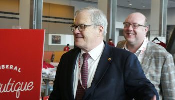 Agriculture Minister Lawrence MacAulay, left, with his now-former chief of staff Matthew Mann at the Liberal Party convention in Ottawa in May 2023.